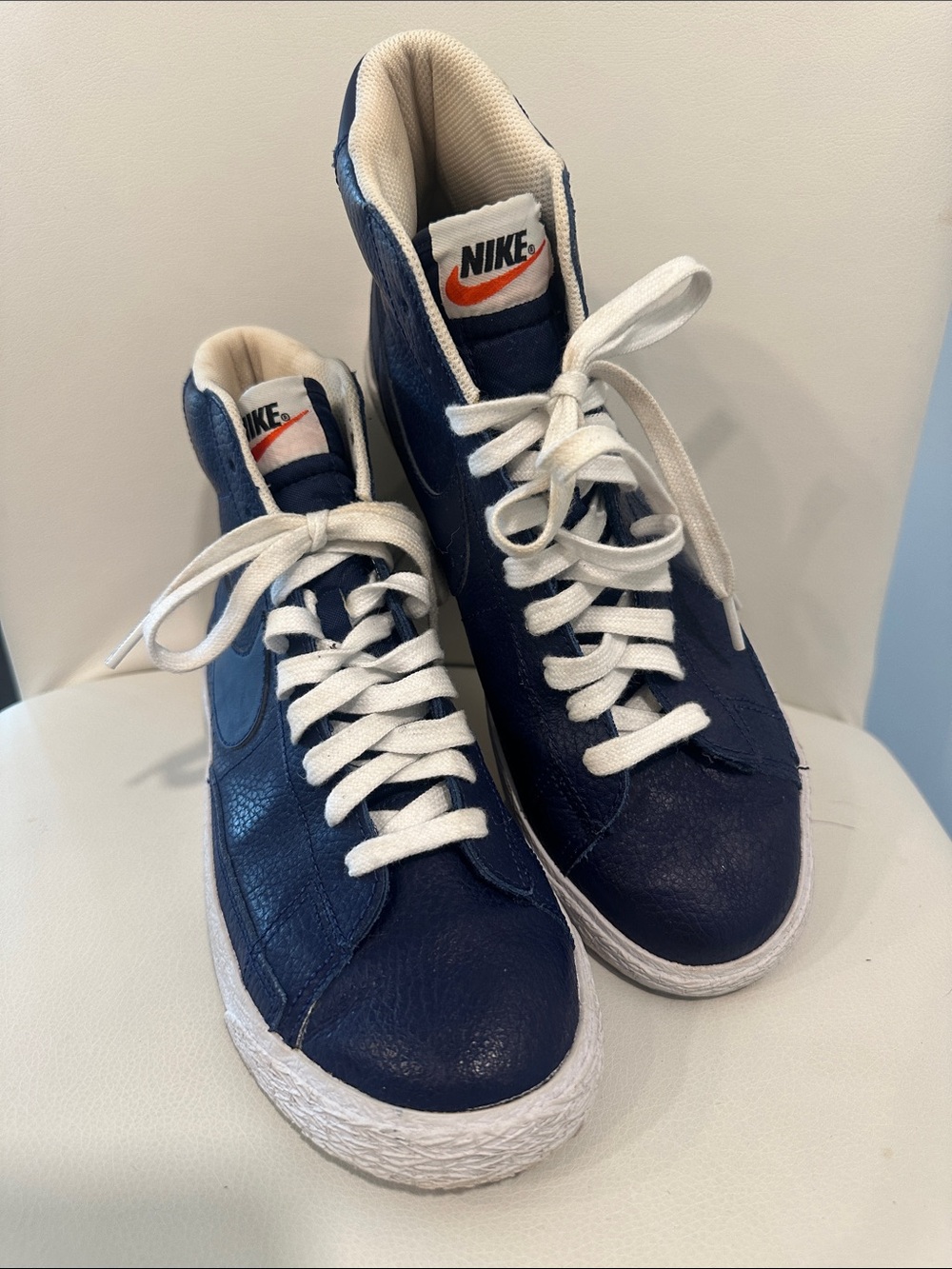 Nike Navy and White High-Top Sneakers with Orange Logo